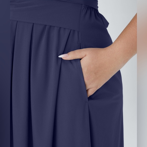 Breezeful V Neck Short Sleeve Pocket Tie Back
Quick Dry Midi Plus Size Dress - Picture 5 of 6